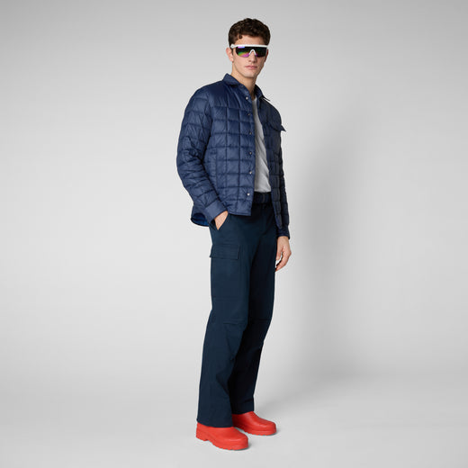 Model Front View of TITAN: Men'S Square Quilted Shirt Jacket In Navy Blue