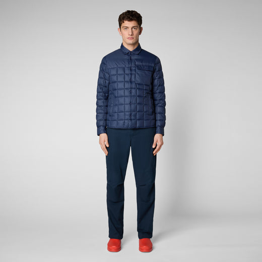 Model Front View of TITAN: Men'S Square Quilted Shirt Jacket In Navy Blue
