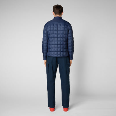 Model Back View of TITAN: Men'S Square Quilted Shirt Jacket In Navy Blue