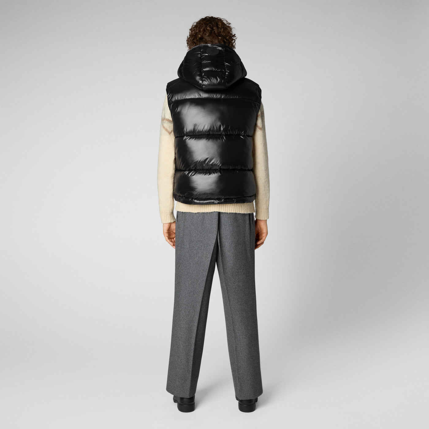 Model Back View of Men's Dexter Hooded Puffer Vest in Black