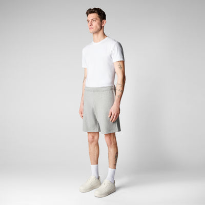 Model Side View of Men's Rayon Sweatshorts in Light Grey Melange