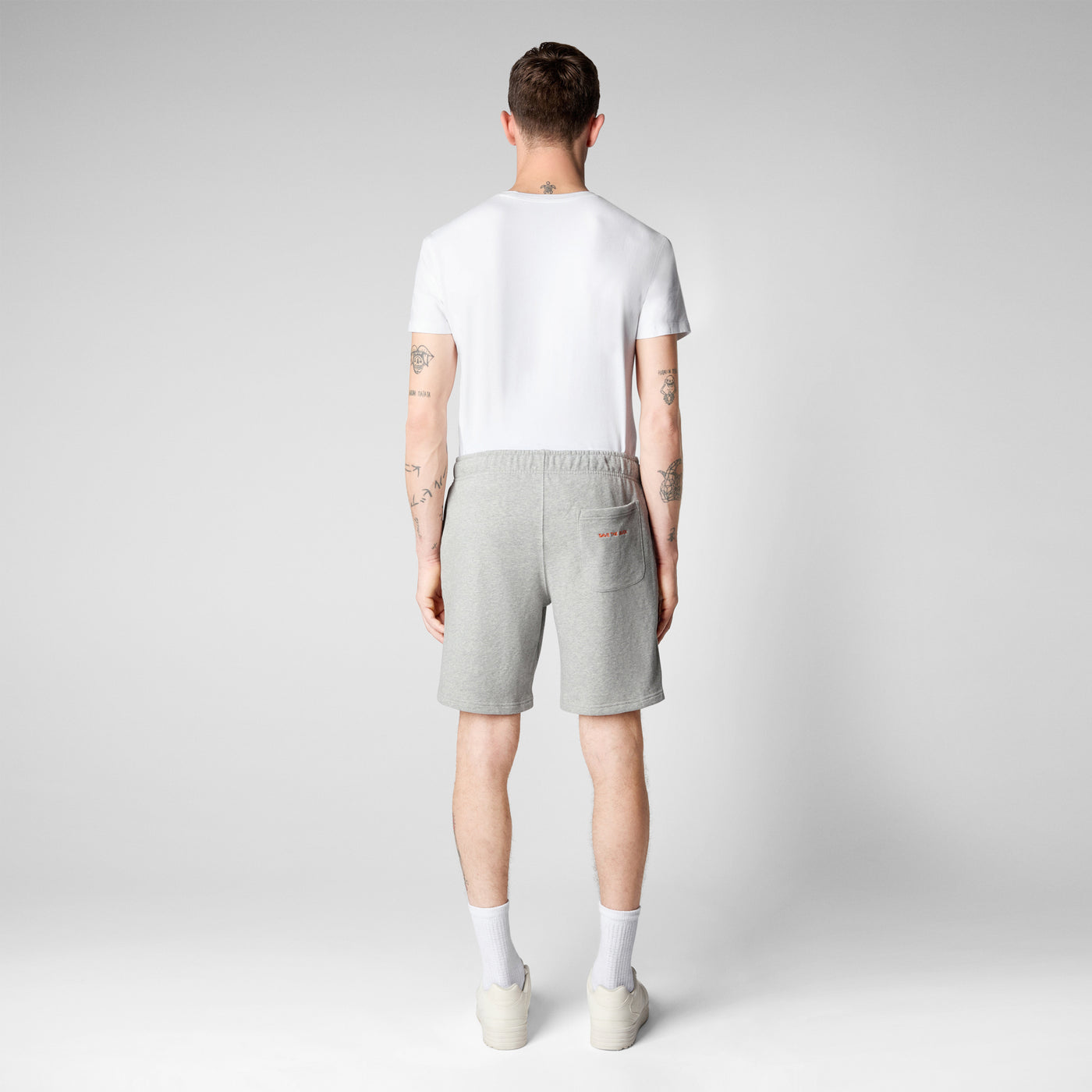 Model Back View of Men's Rayon Sweatshorts in Light Grey Melange