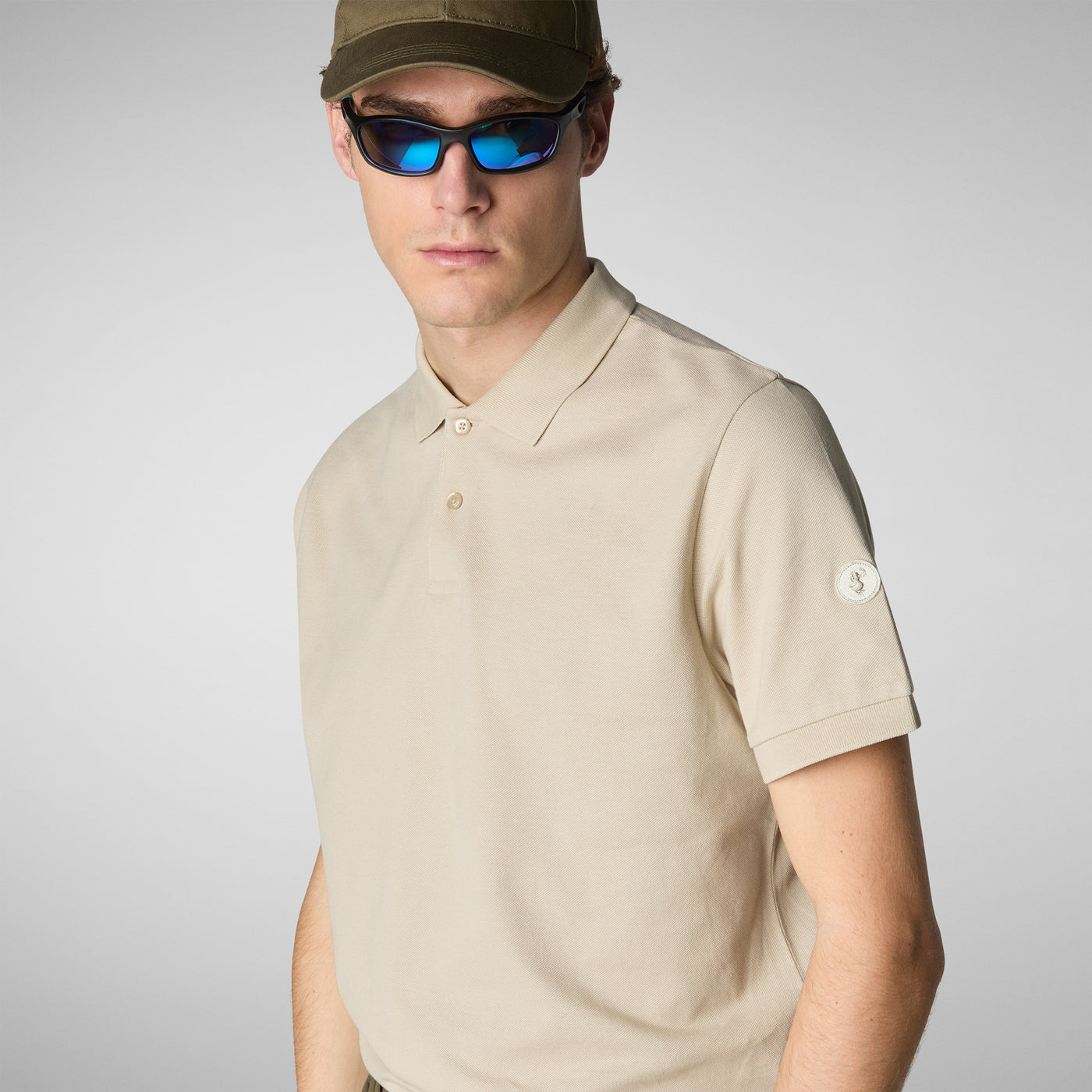 Model close up view of Men's Ovidio Polo Shirt in Rainy Beige