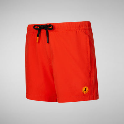 Product Side View of Boys' Adao Swim Trunks in Traffic Red