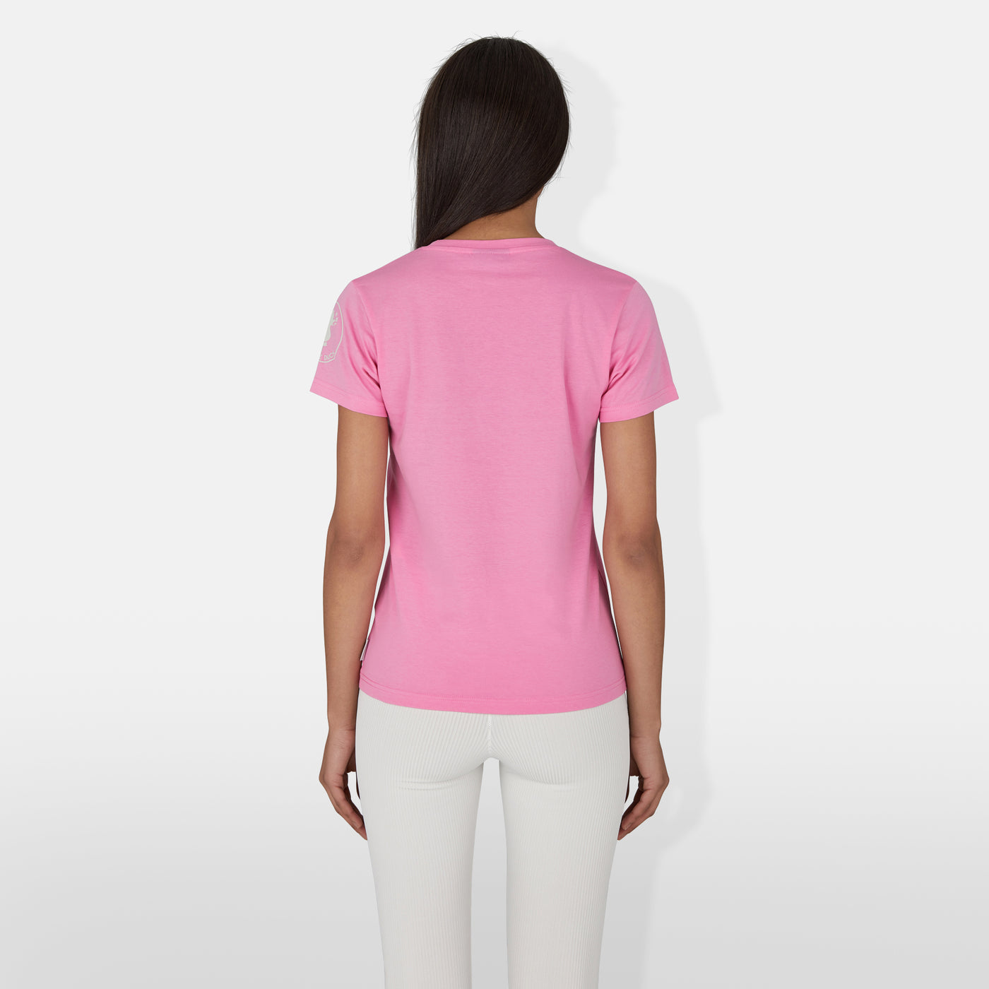 Model Back View of Women's Betsy T-Shirt in Aurora Pink