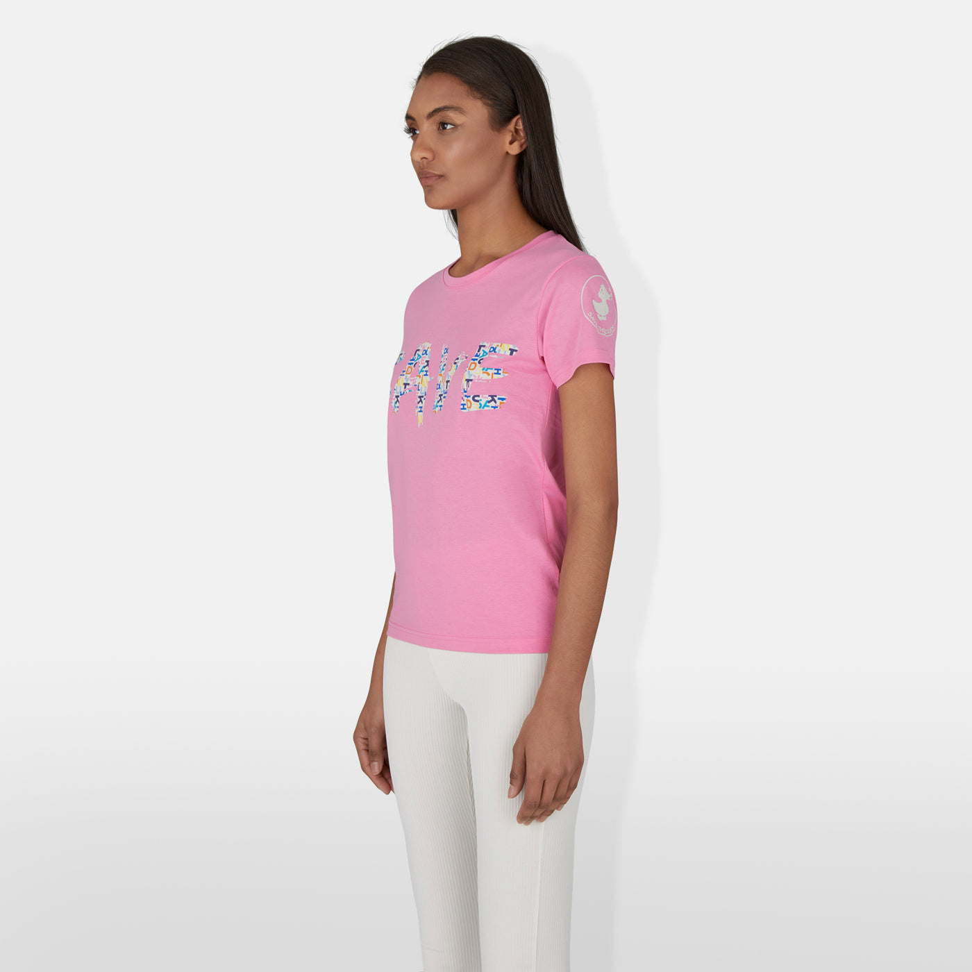 Model Side View of Women's Betsy T-Shirt in Aurora Pink